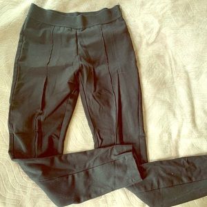 Black stretchy dress pants with hem detail